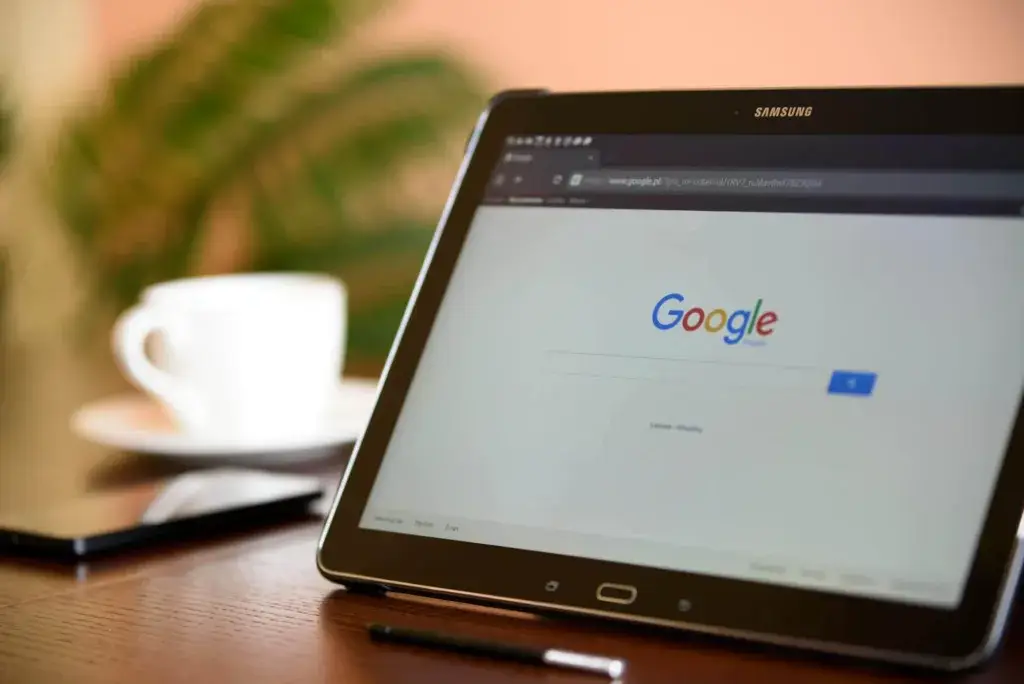An image of a laptop with Google on it representing Soulheart's blog titled Ranking #1 on Google for a High Volume Keyword in 1 Month