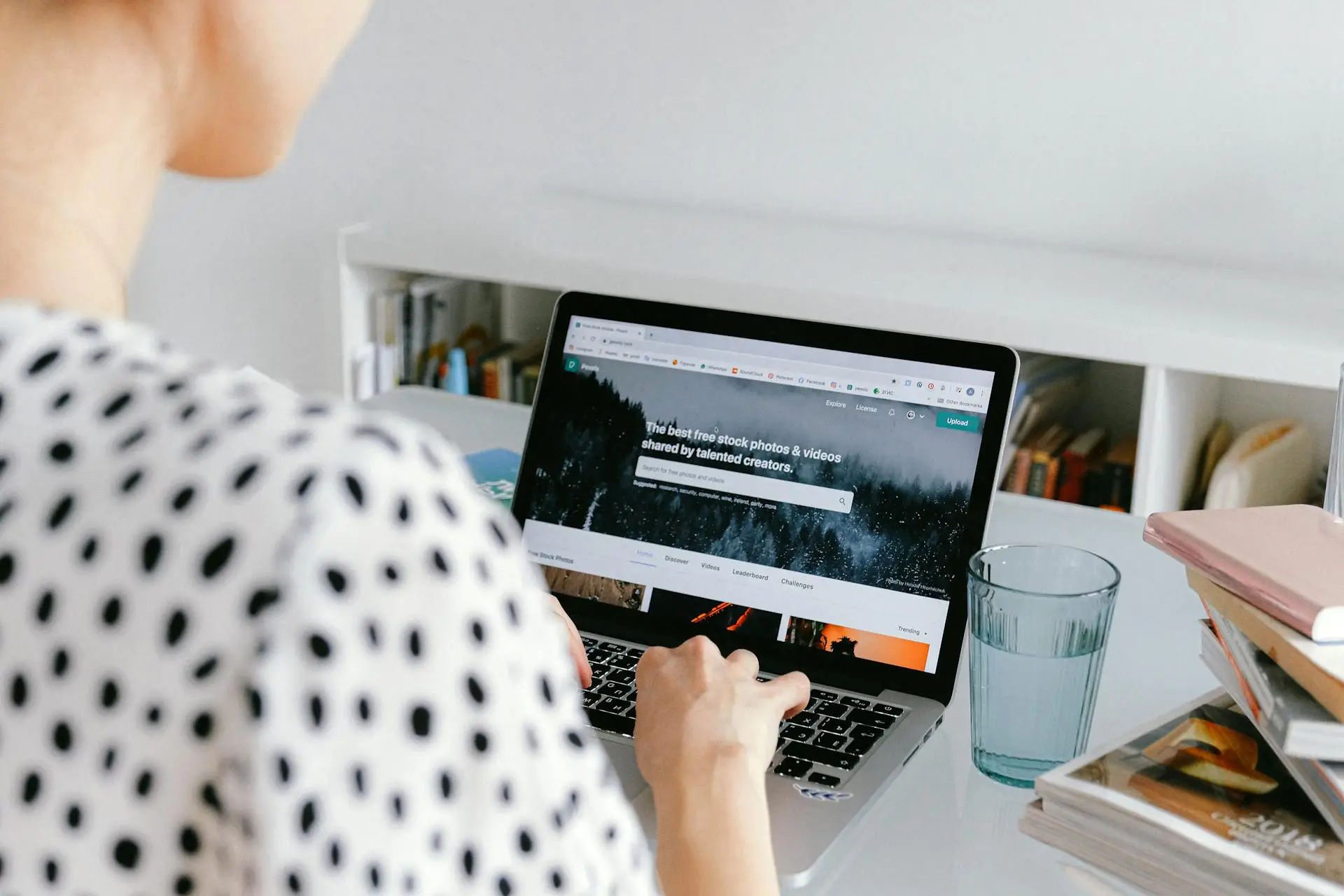 An image of a woman working on her laptop representing Soulheart's blog titled Advance Your Career - Social Media Training For Digital Marketers
