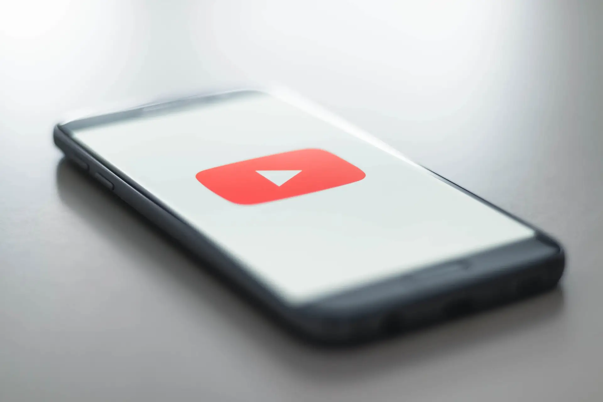 An image of a phone displaying the YouTube icon representing Soulheart's blog titled YouTube Ads 101.