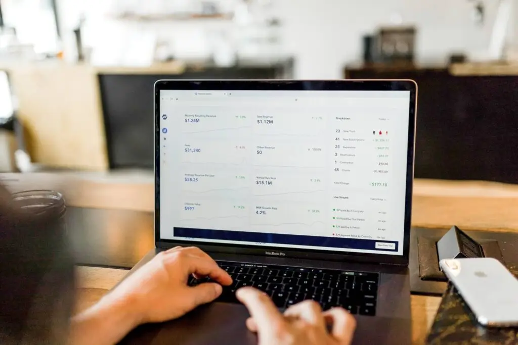 An image of a someone looking at analytics on a laptop representing Soulheart's blog explaining how to use youtube advertising.