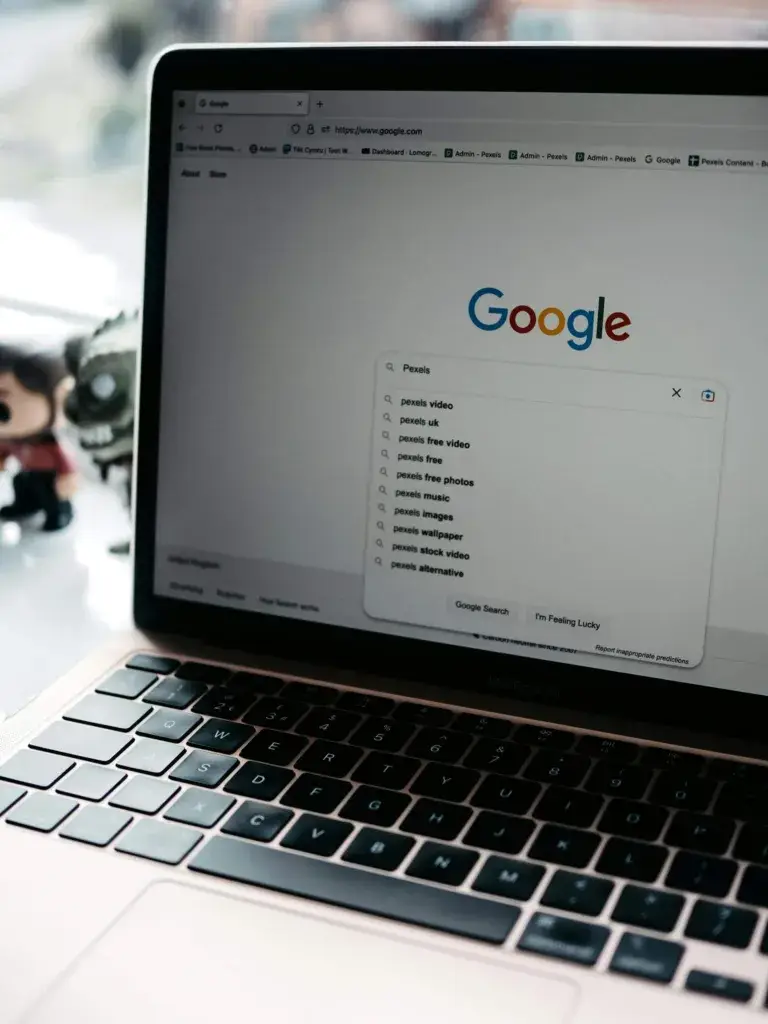 An image of someone searching words on Google representing Soulheart's blog titled Ranking #1 on Google for a High Volume Keyword in 1 Month