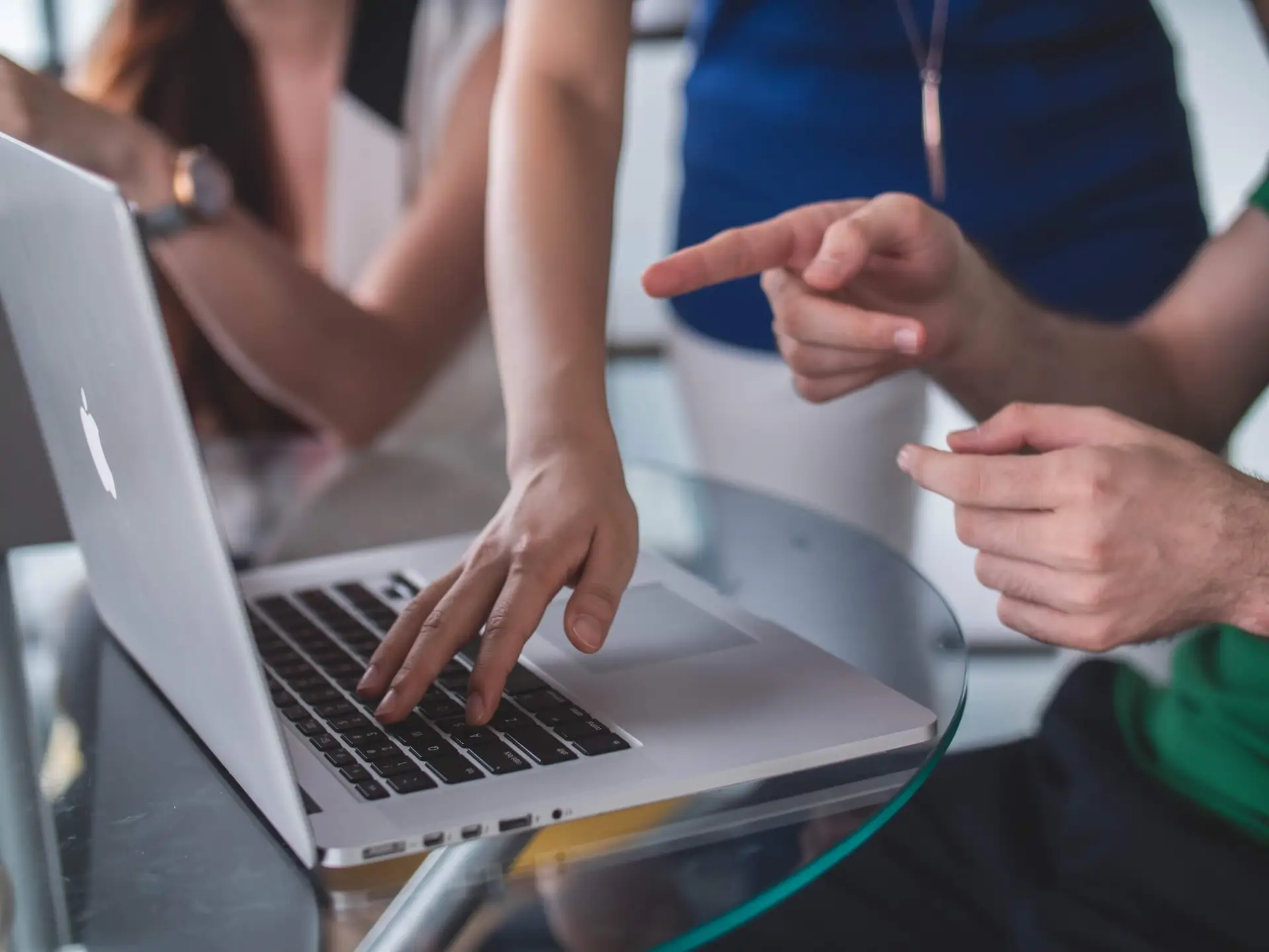 An image of someone on a computer representing Soulheart's blog titled Content Excellence: 5 Benefits of Working with Digital Marketers.|