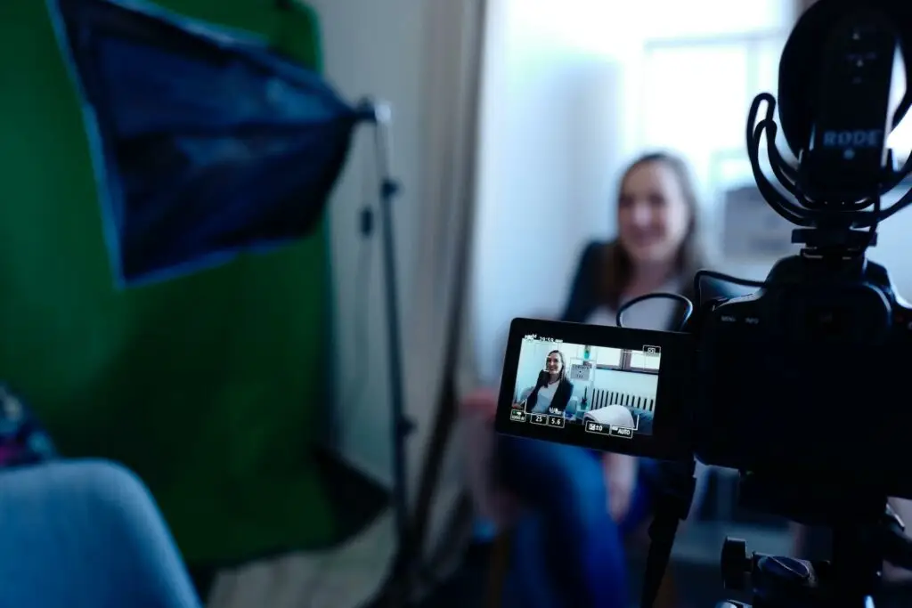 An image of a woman being filmed for a professional video representing Soulheart's blog titled Digital Marketing Trends Nonprofit Organizations Need to Know.