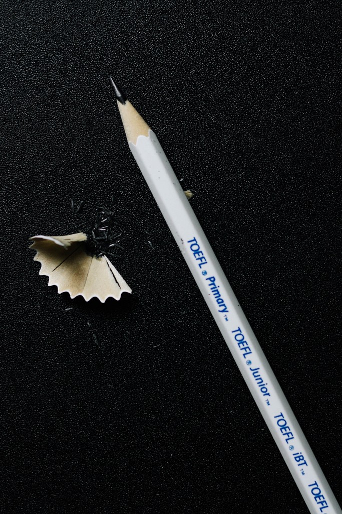 white and blue pencil on black textile