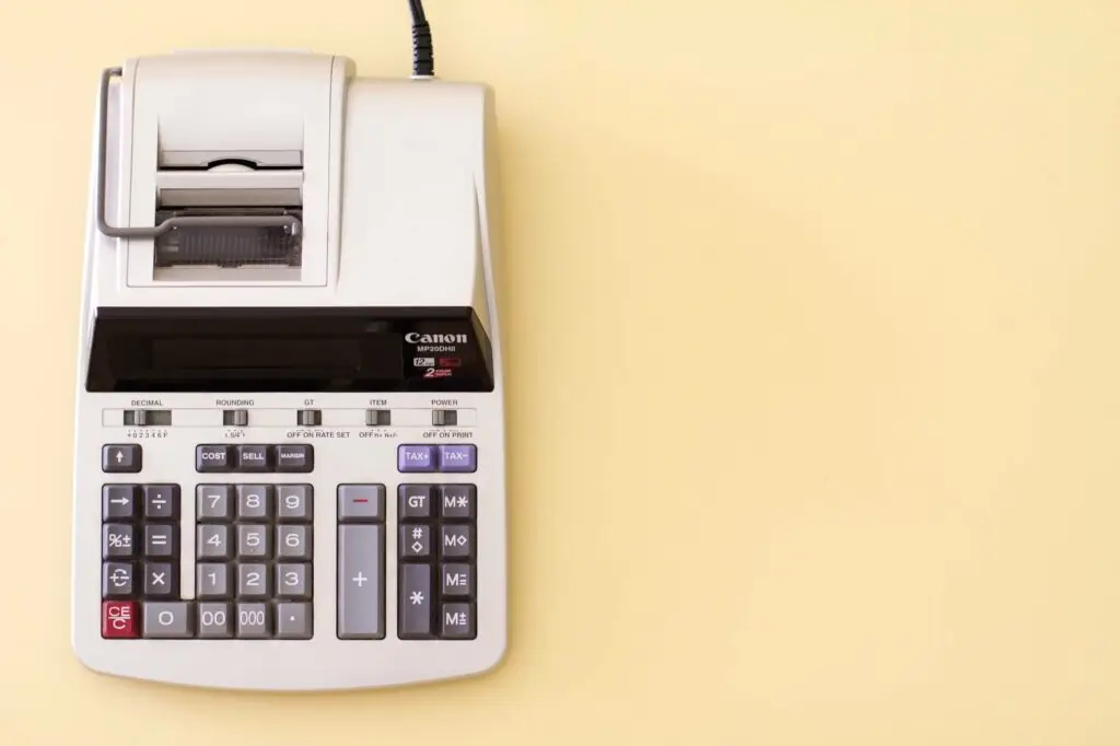 Image of a calculator representing Soulheart's blog titled "Google Ad Grants Not Approved? Here's What To Do Next!" which is an article about nonprofit google ads.