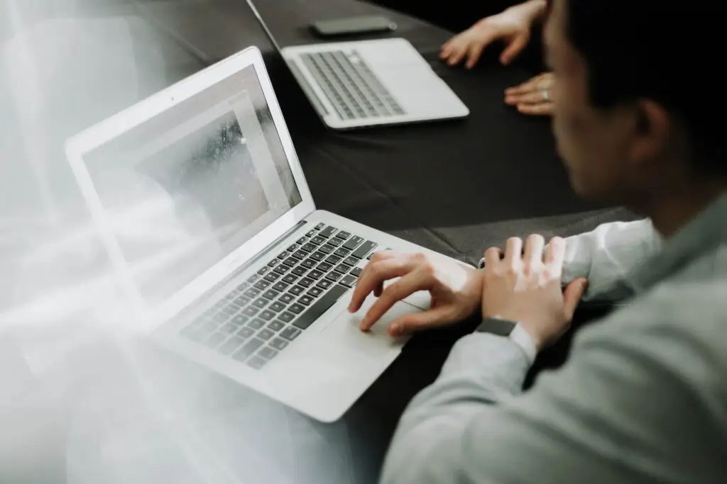 An image of a man on his computer representing Soulheart's blog on email marketing education.