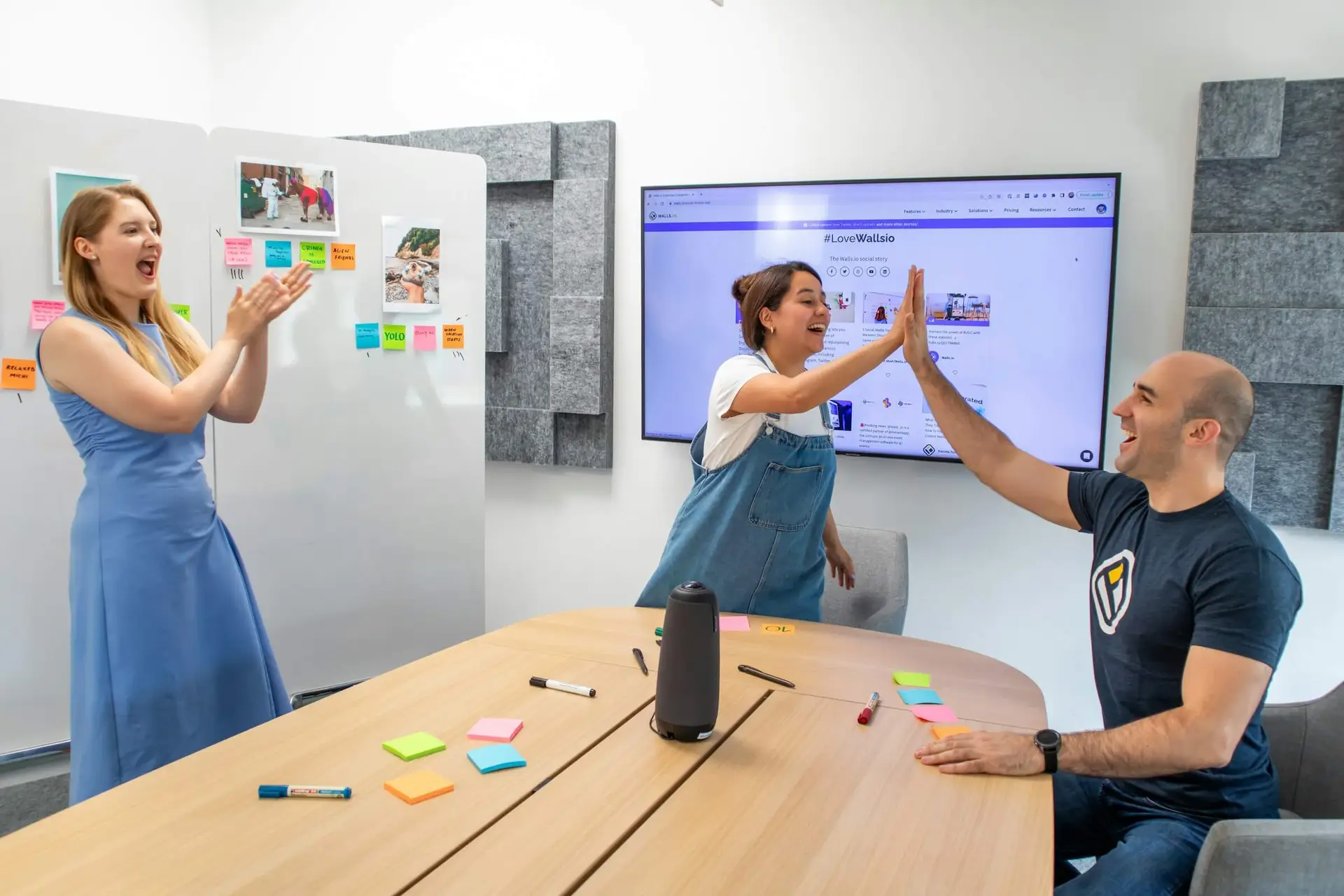 An image of workers high fiving each other representing Soulheart's blog about website optimizations