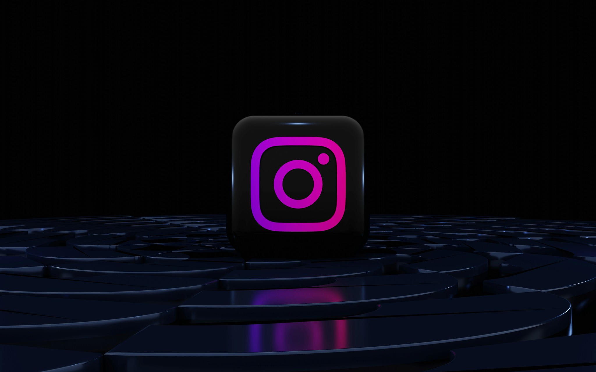 a purple instagram logo on a black background