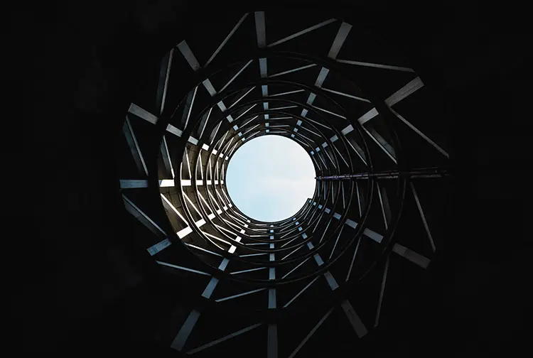 city architecture with sky opening at the top