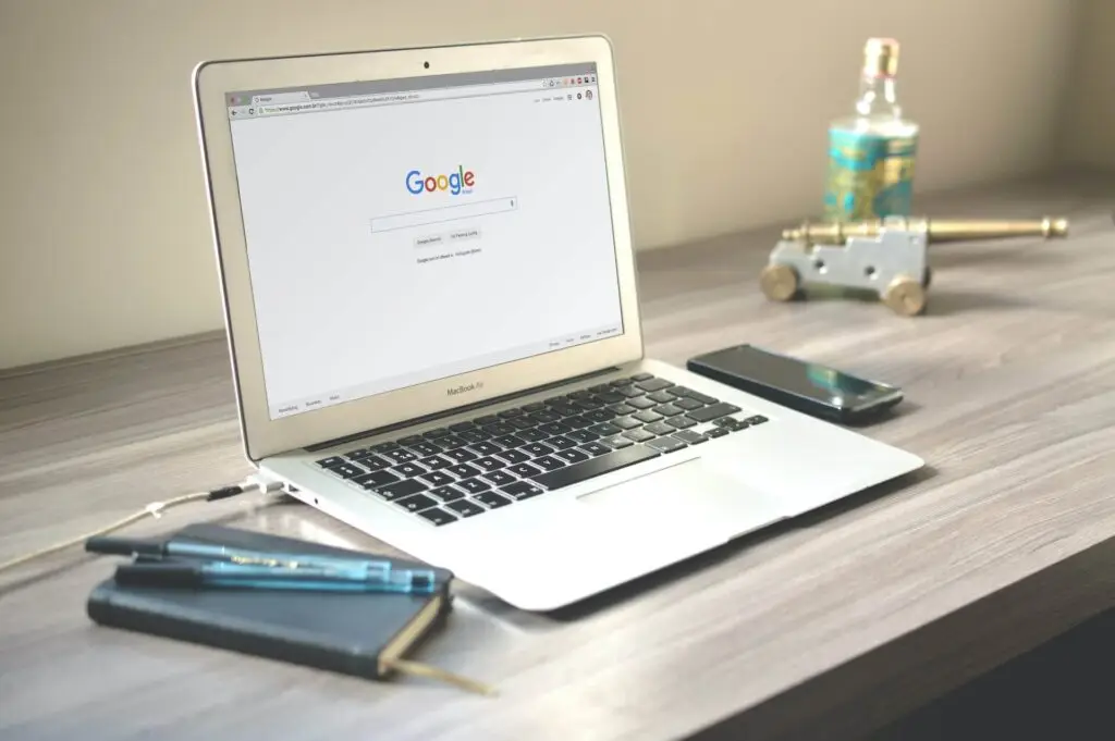 An image of a laptop open with Google on it representing Soulheart's blog titled SEO Training for Success: Amplify Your Skills Today.