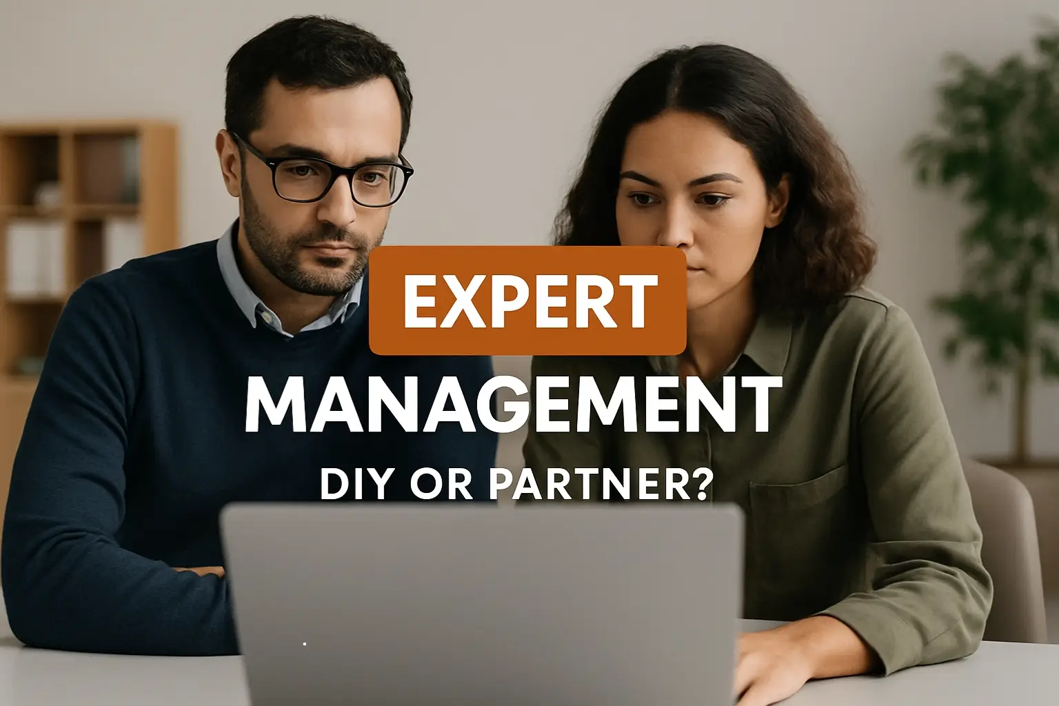 Image of two people looking at a computer representing Soulheart's article: DIY vs Expert Management for Google Grants: What Nonprofits Need to Know